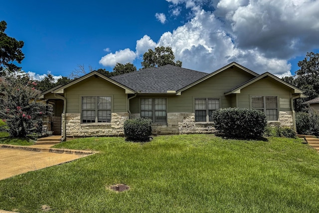 113 Bolero Way, Huntsville, TX 77340 - ranch-style house featuring stone siding, a front lawn, and a shingled roof