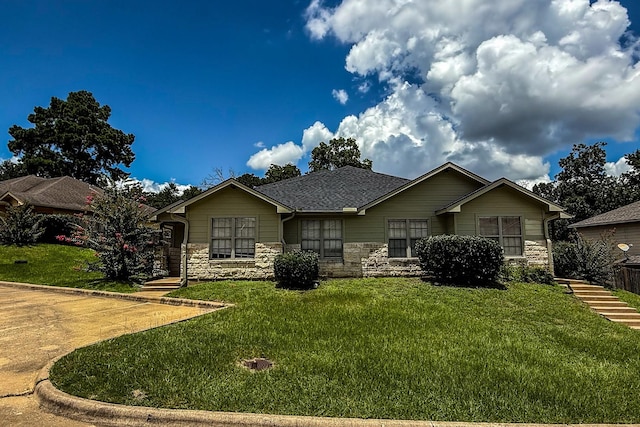 113 Bolero Way, Huntsville, TX 77340 - single story home featuring stone siding, a front yard, and roof with shingles