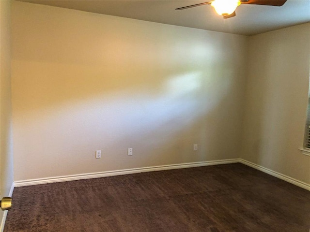 113 Bolero Way, Huntsville, TX 77340 - spare room featuring ceiling fan and dark carpet