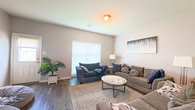 1855 Garnet Breeze Dr, Rosharon, TX 77583 - living area featuring wood finished floors and baseboards