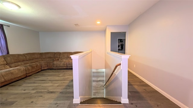 1855 Garnet Breeze Dr, Rosharon, TX 77583 - unfurnished living room with wood finished floors and recessed lighting