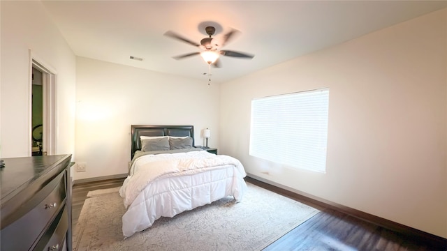 1855 Garnet Breeze Dr, Rosharon, TX 77583 - bedroom featuring wood finished floors and a ceiling fan