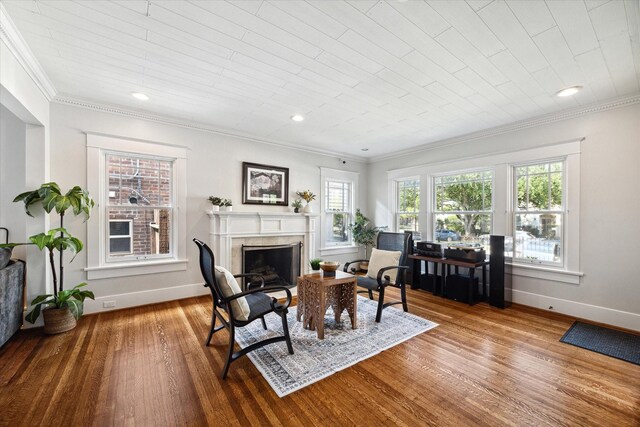 3404 Audubon Pl, Houston, TX 77006 - living room featuring ornamental molding, wood finished floors, a premium fireplace, and recessed lighting