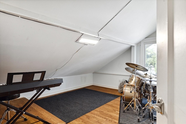 3404 Audubon Pl, Houston, TX 77006 - additional living space featuring vaulted ceiling and wood finished floors