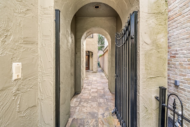 2217 Dunraven Ln, Houston, TX 77019 - corridor with arched walkways