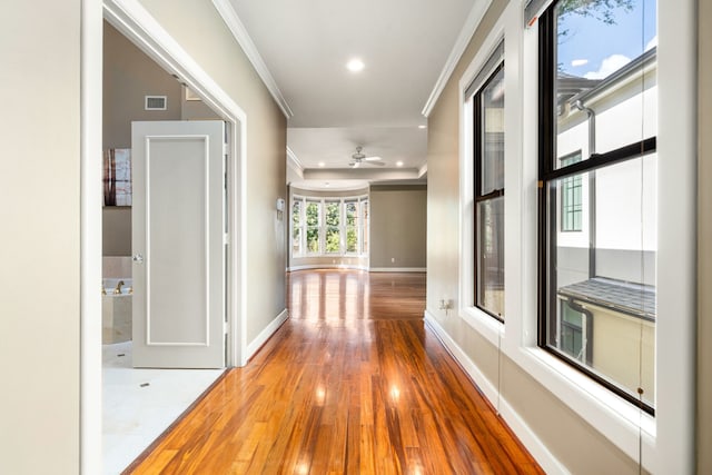 2217 Dunraven Ln, Houston, TX 77019 - hall featuring ornamental molding, wood finished floors, and recessed lighting