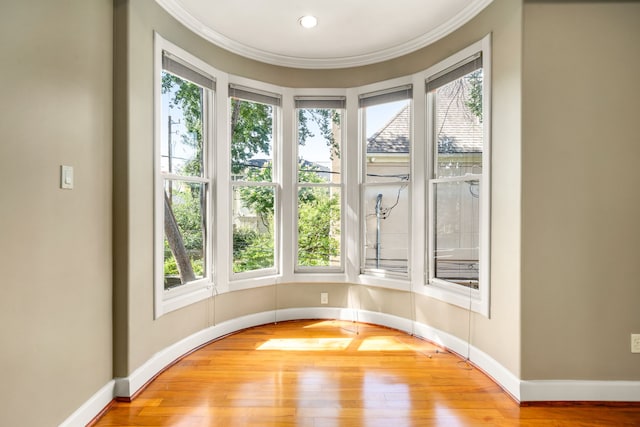 2217 Dunraven Ln, Houston, TX 77019 - unfurnished room with healthy amount of natural light, wood finished floors, ornamental molding, and recessed lighting