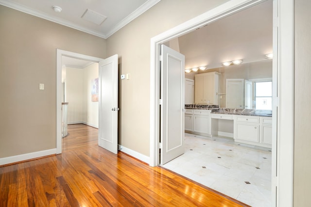 2217 Dunraven Ln, Houston, TX 77019 - bathroom featuring vanity, ornamental molding, and wood finished floors