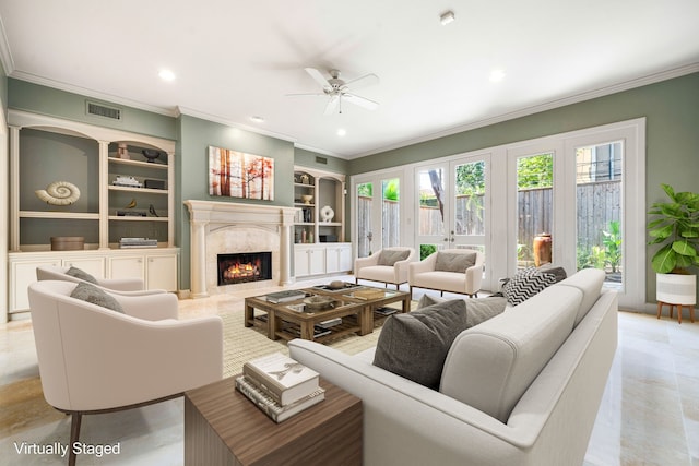 2217 Dunraven Ln, Houston, TX 77019 - living area with built in shelves, ornamental molding, ceiling fan, a high end fireplace, and recessed lighting