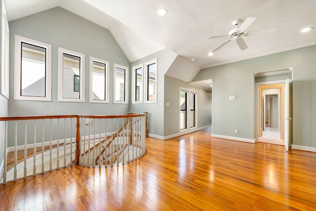 2217 Dunraven Ln, Houston, TX 77019 - spare room featuring lofted ceiling, wood finished floors, ceiling fan, recessed lighting, and crown molding