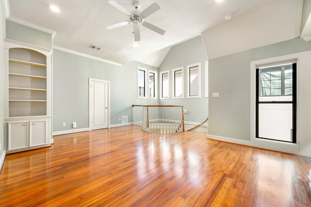 2217 Dunraven Ln, Houston, TX 77019 - spare room featuring ceiling fan, light wood-style floors, vaulted ceiling, recessed lighting, and crown molding