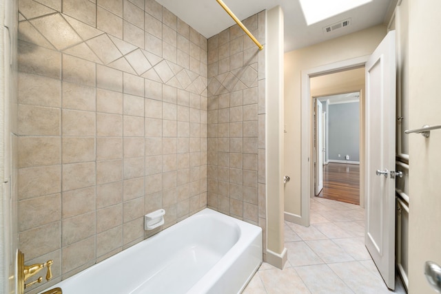 2217 Dunraven Ln, Houston, TX 77019 - bathroom with tile patterned floors and shower / tub combination