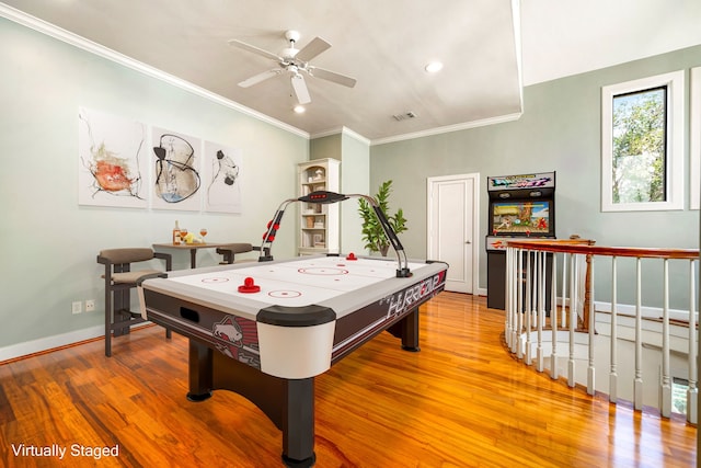 2217 Dunraven Ln, Houston, TX 77019 - playroom with wood finished floors, crown molding, a ceiling fan, and recessed lighting