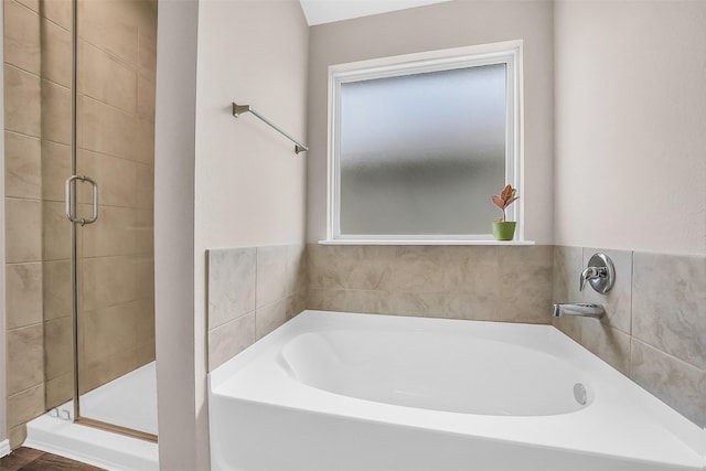 4310 Fornari Ln, Katy, TX 77449 - bathroom featuring a shower stall and a garden tub