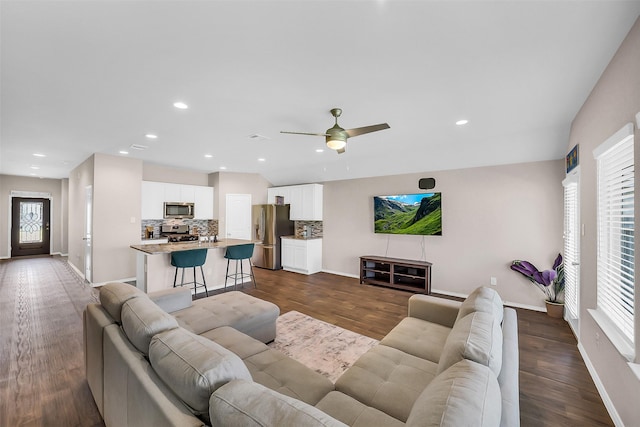 4310 Fornari Ln, Katy, TX 77449 - living area with plenty of natural light, a ceiling fan, dark wood-style flooring, and recessed lighting