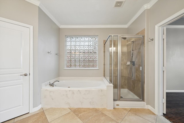 2508 Siskin Trl, League City, TX 77573 - full bath featuring a shower stall, a bath, ornamental molding, and tile patterned floors