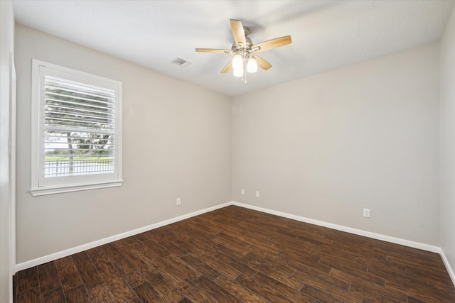 2508 Siskin Trl, League City, TX 77573 - spare room featuring dark wood-style floors and a ceiling fan