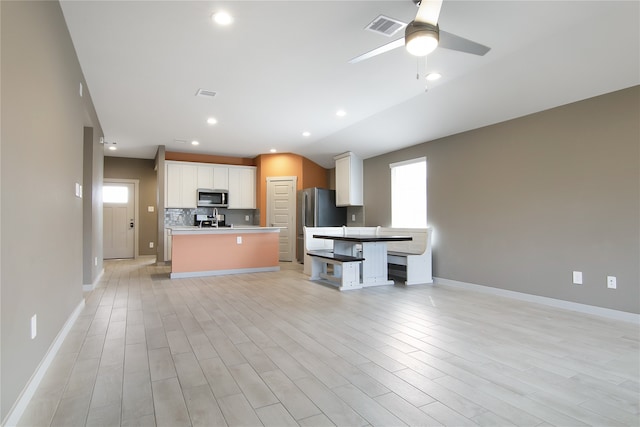 13333 Diamond Reef Ln, Texas City, TX 77568 - kitchen featuring stainless steel appliances, plenty of natural light, open floor plan, and recessed lighting