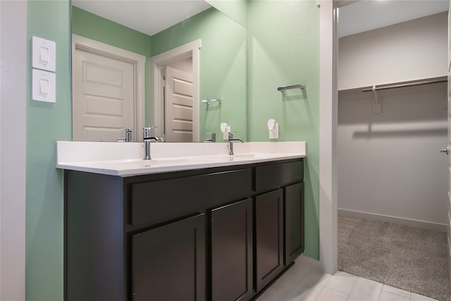 13333 Diamond Reef Ln, Texas City, TX 77568 - full bath featuring a walk in closet, double vanity, and tile patterned floors