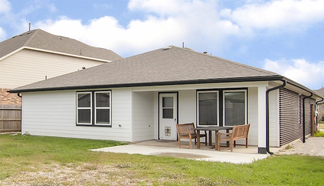13333 Diamond Reef Ln, Texas City, TX 77568 - rear view of house featuring a patio and a shingled roof