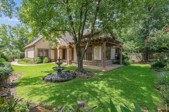 102 W Racing Cloud Ct, The Woodlands, TX 77381 - view of front of home featuring a pergola, stucco siding, stone siding, and a patio