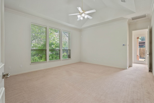 102 W Racing Cloud Ct, The Woodlands, TX 77381 - empty room featuring plenty of natural light, light colored carpet, a ceiling fan, lofted ceiling, and crown molding