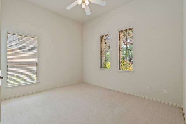 102 W Racing Cloud Ct, The Woodlands, TX 77381 - carpeted spare room with ceiling fan and baseboards