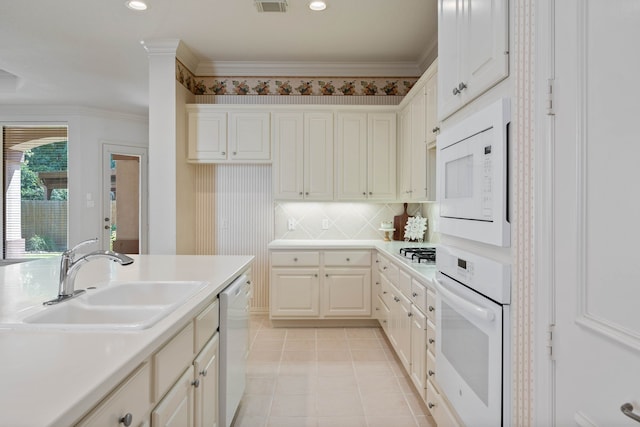 102 W Racing Cloud Ct, The Woodlands, TX 77381 - kitchen with white appliances, light countertops, light tile patterned flooring, crown molding, and recessed lighting