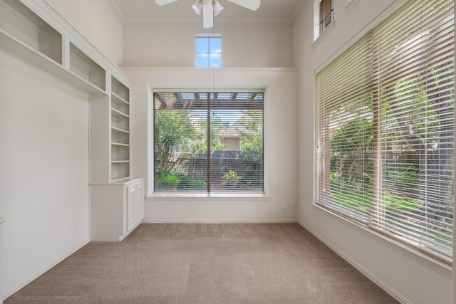 102 W Racing Cloud Ct, The Woodlands, TX 77381 - carpeted empty room featuring ceiling fan and crown molding