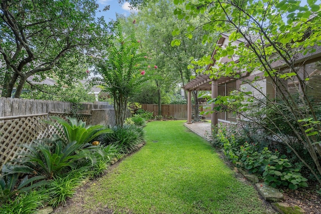 102 W Racing Cloud Ct, The Woodlands, TX 77381 - fenced backyard featuring a pergola