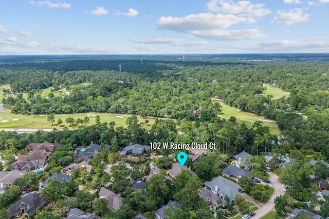 102 W Racing Cloud Ct, The Woodlands, TX 77381 - view of property location featuring a forest and nearby suburban area