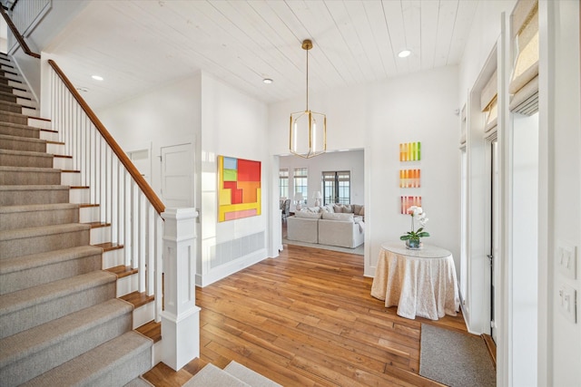 4223 Swashbuckle, Galveston, TX 77554 - foyer with light wood-style flooring, stairs, recessed lighting, wood ceiling, and a towering ceiling