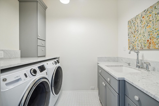 4223 Swashbuckle, Galveston, TX 77554 - laundry room featuring washing machine and dryer, cabinet space, and tile patterned floors