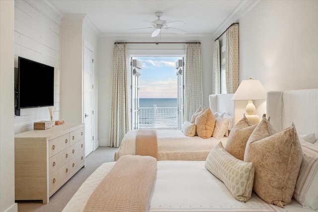 4223 Swashbuckle, Galveston, TX 77554 - bedroom with ornamental molding, access to exterior, light carpet, multiple windows, and a water view