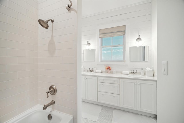 4223 Swashbuckle, Galveston, TX 77554 - full bath featuring shower / tub combination, double vanity, and tile patterned flooring