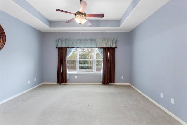 402 Starleaf Ln, Pearland, TX 77584 - carpeted spare room with a tray ceiling and a ceiling fan