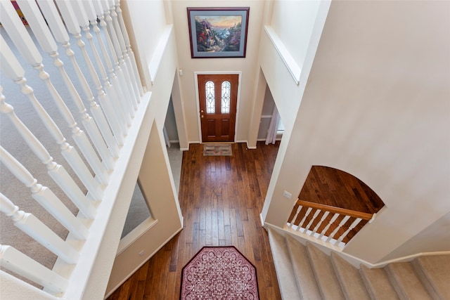 402 Starleaf Ln, Pearland, TX 77584 - entryway with stairs, hardwood / wood-style floors, and a high ceiling
