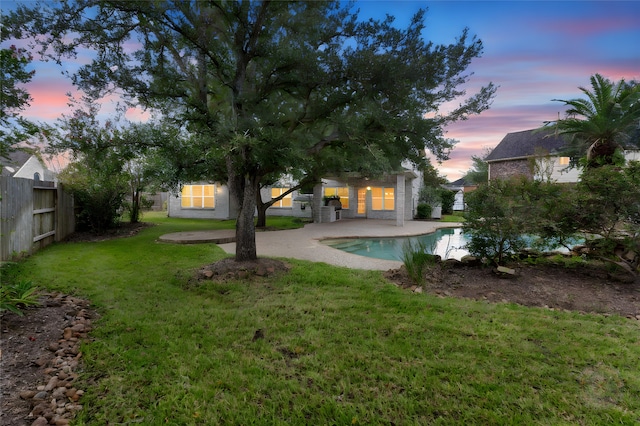402 Starleaf Ln, Pearland, TX 77584 - rear view of house featuring a patio