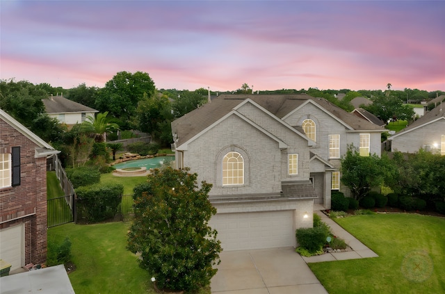 402 Starleaf Ln, Pearland, TX 77584 - traditional-style home featuring brick siding, driveway, and an attached garage
