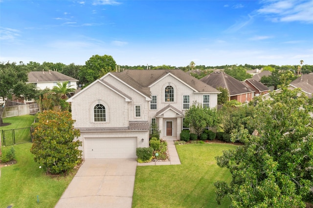402 Starleaf Ln, Pearland, TX 77584 - view of front of house featuring brick siding, an attached garage, and driveway