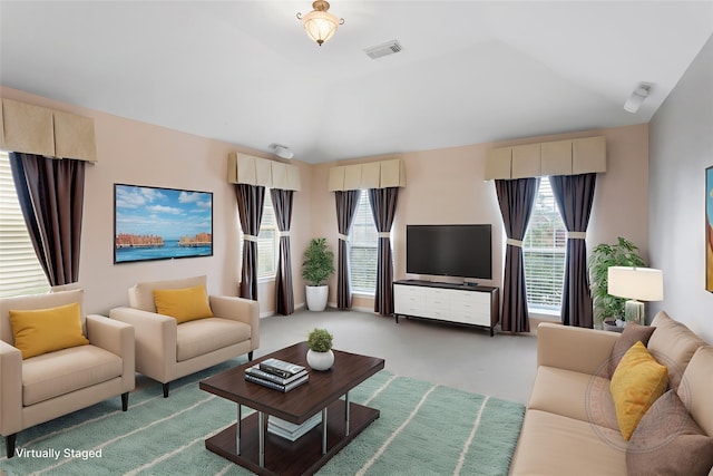 402 Starleaf Ln, Pearland, TX 77584 - living area with plenty of natural light, light colored carpet, and lofted ceiling