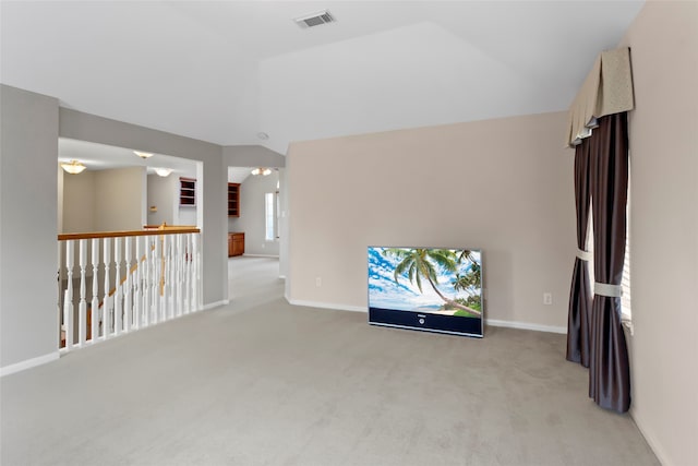 402 Starleaf Ln, Pearland, TX 77584 - unfurnished living room with carpet floors and lofted ceiling