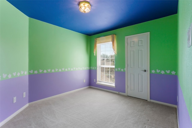 402 Starleaf Ln, Pearland, TX 77584 - carpeted empty room featuring baseboards