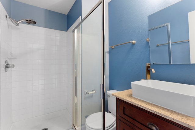 402 Starleaf Ln, Pearland, TX 77584 - bathroom featuring a shower stall and vanity