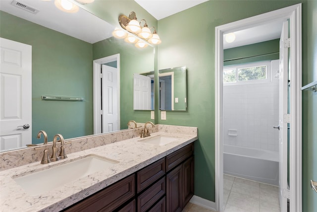 402 Starleaf Ln, Pearland, TX 77584 - full bathroom with double vanity, tile patterned flooring, and shower / bath combination