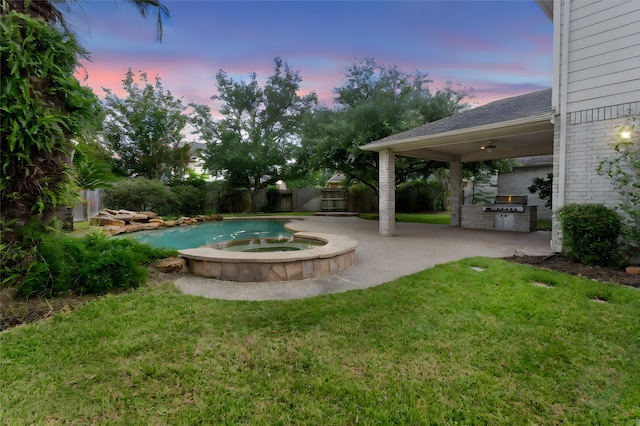 402 Starleaf Ln, Pearland, TX 77584 - yard at dusk with area for grilling, a patio, a fenced backyard, a pool with connected hot tub, and a ceiling fan