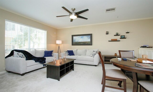6607 Lake Woodlands Dr Unit 223, The Woodlands, TX 77382 - living area featuring a ceiling fan, crown molding, and light carpet