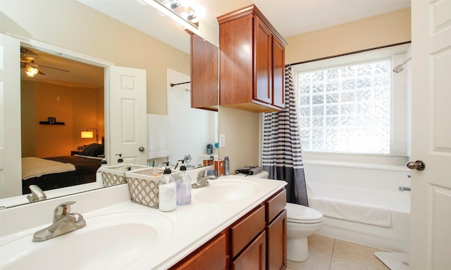 6607 Lake Woodlands Dr Unit 223, The Woodlands, TX 77382 - ensuite bathroom with ceiling fan, double vanity, tile patterned floors, and shower / bath combination with curtain