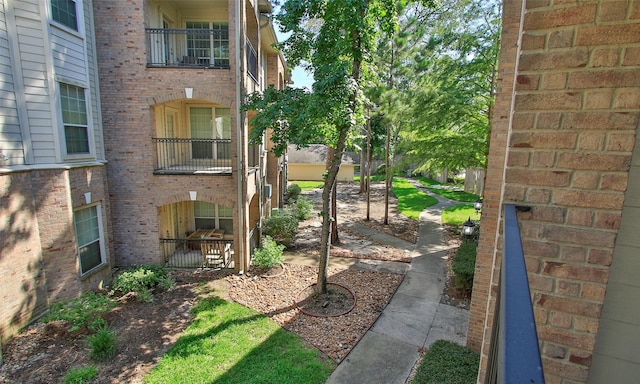 6607 Lake Woodlands Dr Unit 223, The Woodlands, TX 77382 - view of yard with a balcony
