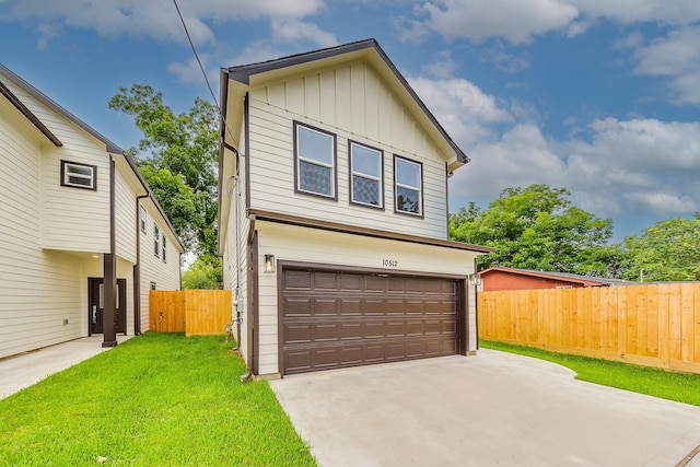 10512 Exeter St, Houston, TX 77093 - view of front of home featuring a garage, board and batten siding, and concrete driveway
